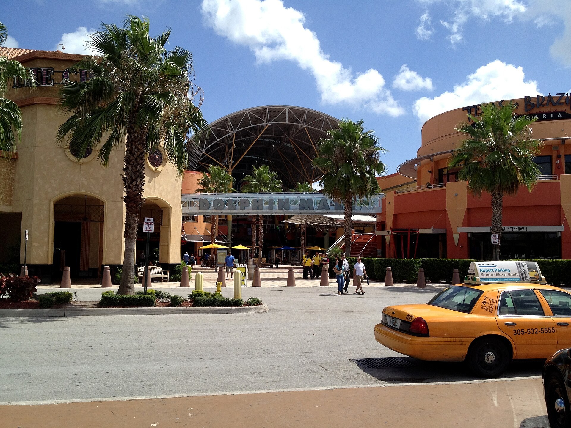 Dolphin Mall visitor guide with stores, hours and parking tips